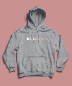 Faking in love Unisex Hoodie Everyone needs a cozy go-to hoodie to curl up in, so go for one that's soft, smooth, and stylish. It's the perfect choice for cooler evenings!